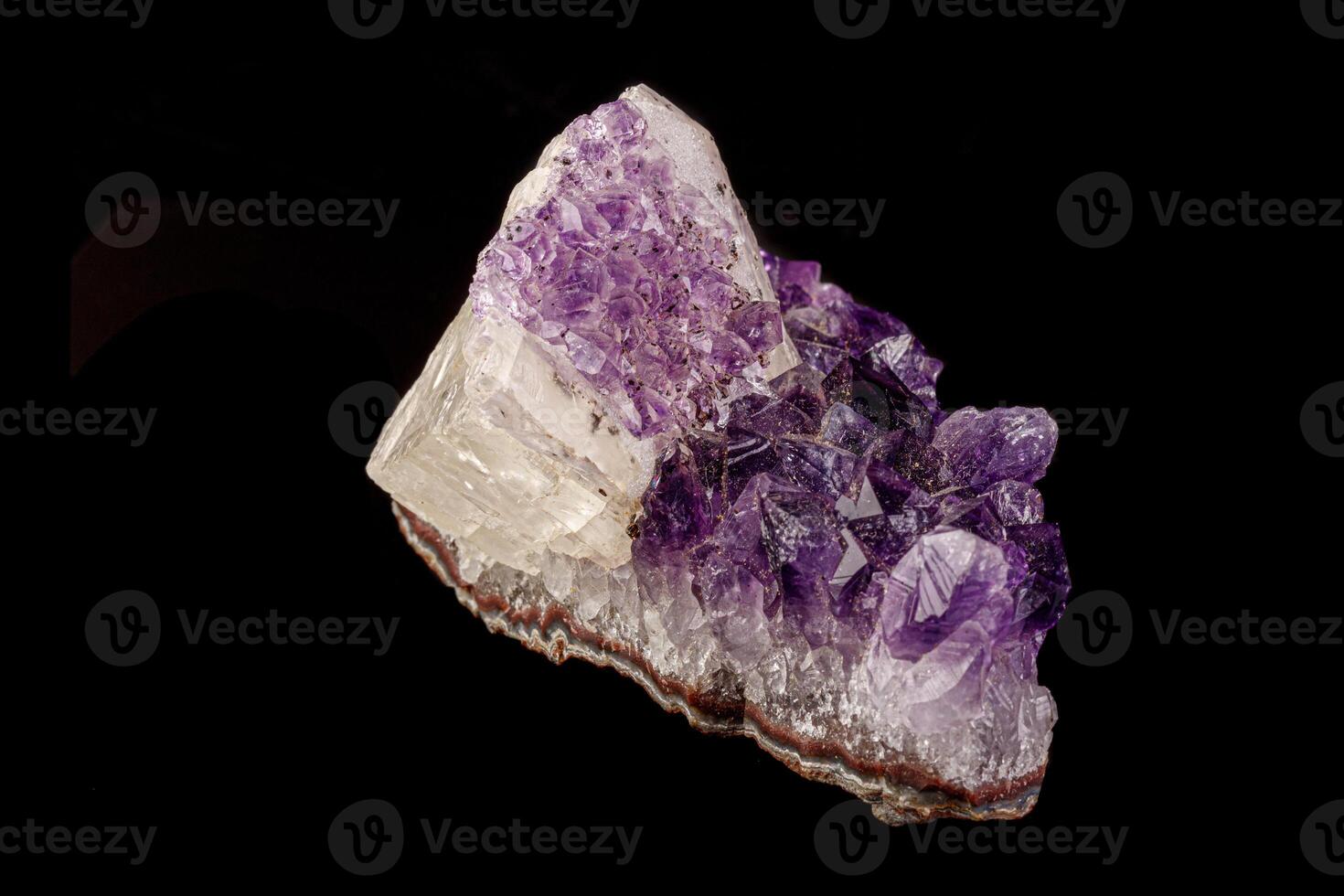macro mineral amethyst stone with calcite black background photo