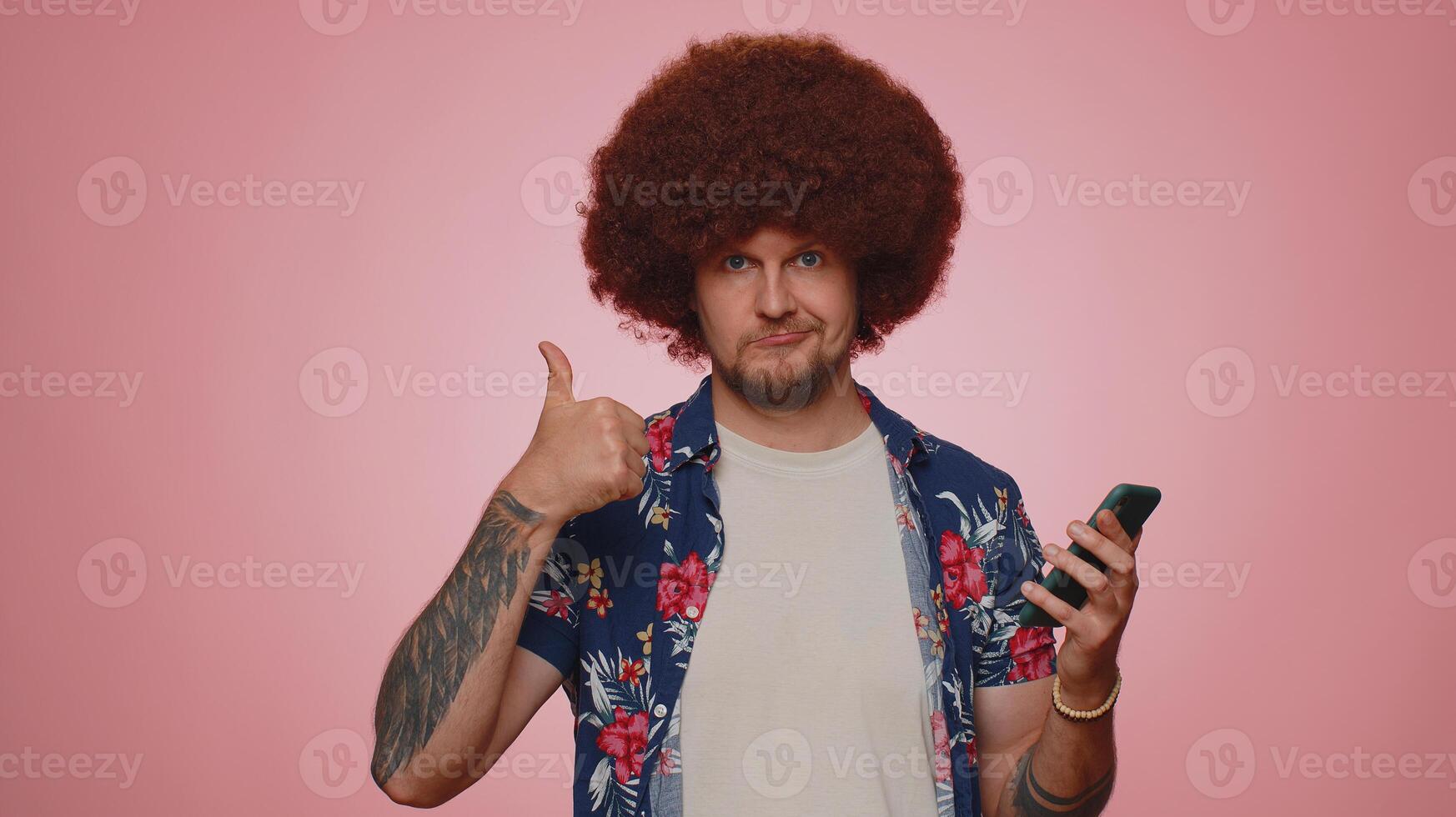 Tourist man using smartphone show thumbs up like, positive feedback, recommends wifi connection 5G photo