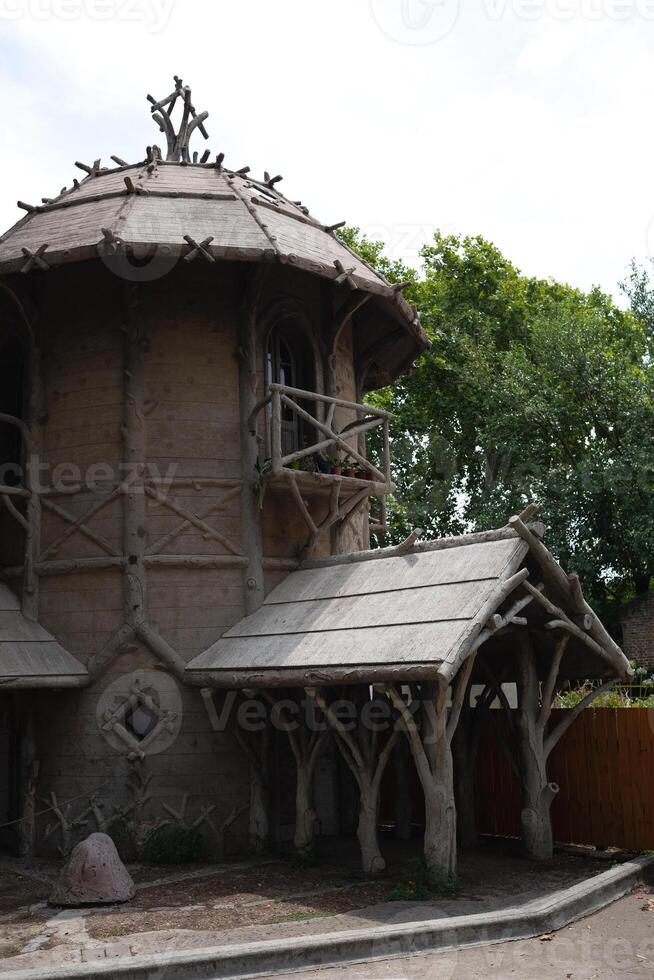 beautiful authentic village house surrounded by greenery. the concept of peace and tranquility photo