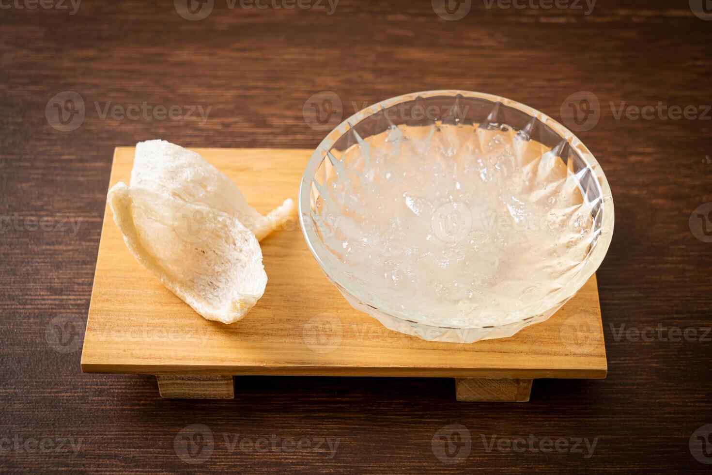 Edible bird's nest soup in glass bowl photo