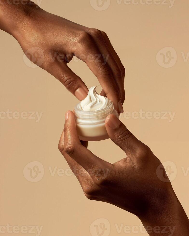 Mock Up of Hands Applying Cream from a Small Jar on Beige Background - Beauty and Cosmetics Product photo