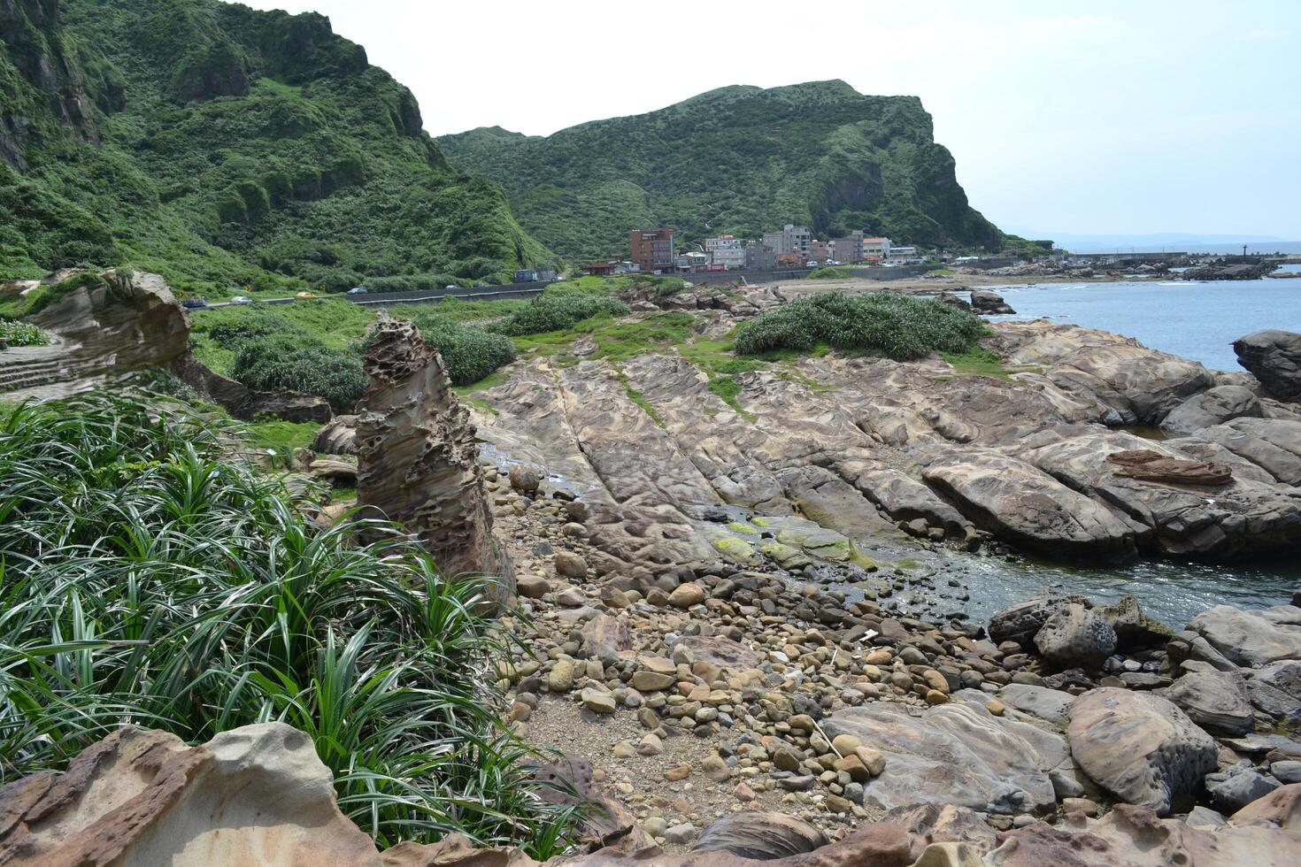 Scenic view of cliffs and beaches in the Nanya rocks area photo