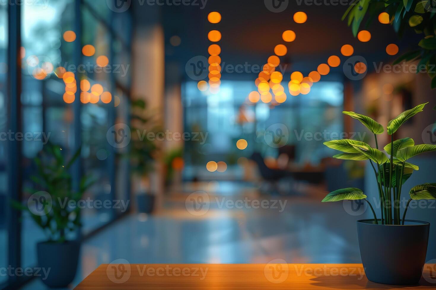 Enter a stylish and contemporary reception area with wooden flooring, indoor plants, and cozy lighting, creating a warm and inviting atmosphere suitable for business and office settings photo
