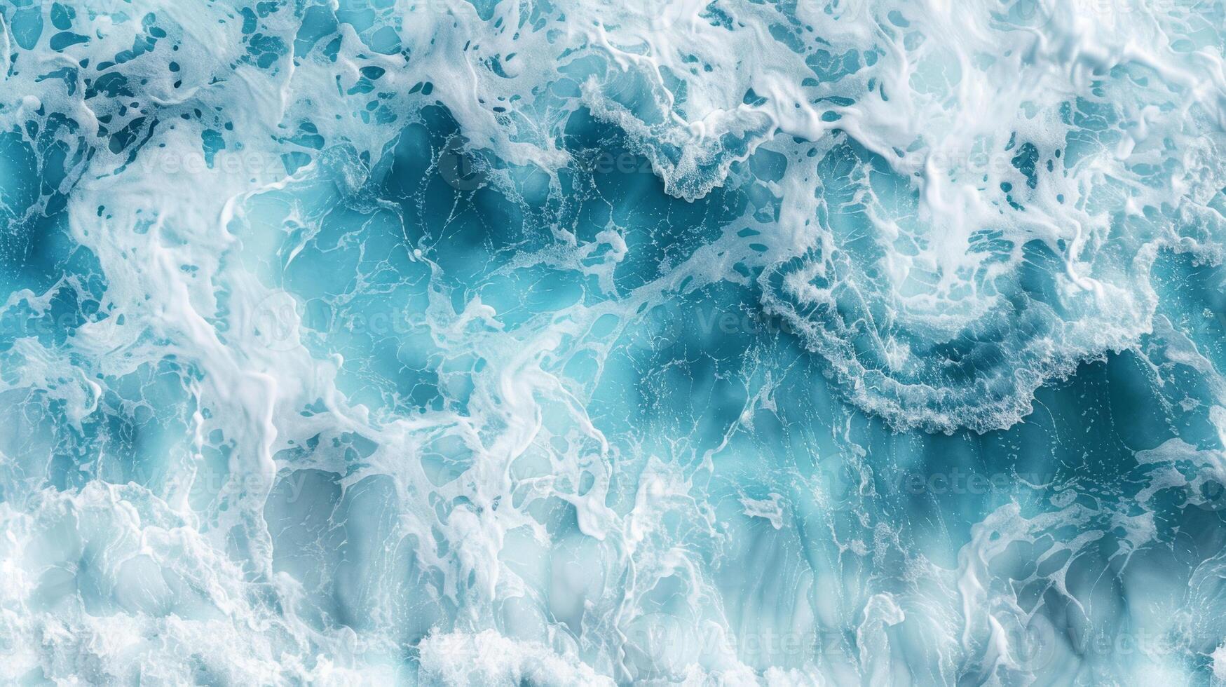 Captured from a stunning aerial view, the immense force and beauty of ocean waves in motion showcase the seas dynamic energy and natural magnificence, revealing a truly breathtaking sight photo