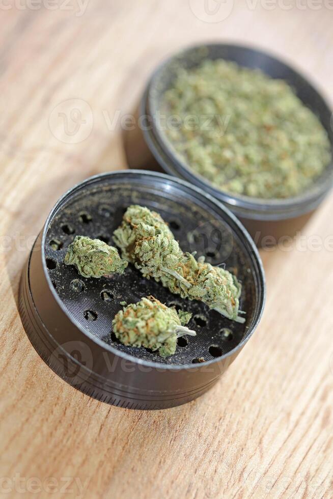 Weed black grinder close up macro medical marihuana instant stock photos images and backgrounds high quality big size print