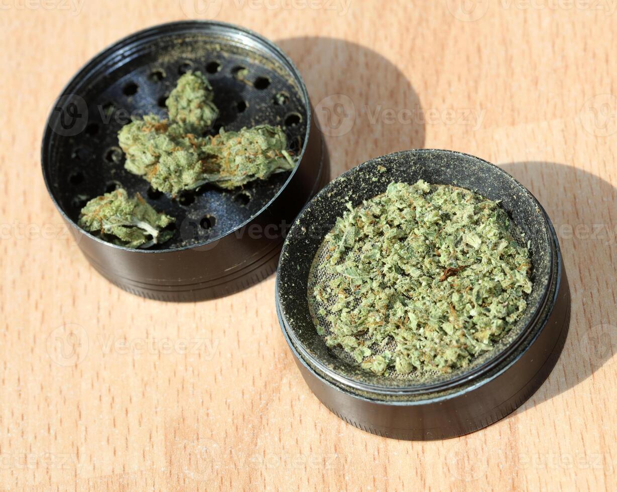 Weed black grinder close up macro medical marihuana instant stock photos images and backgrounds high quality big size print
