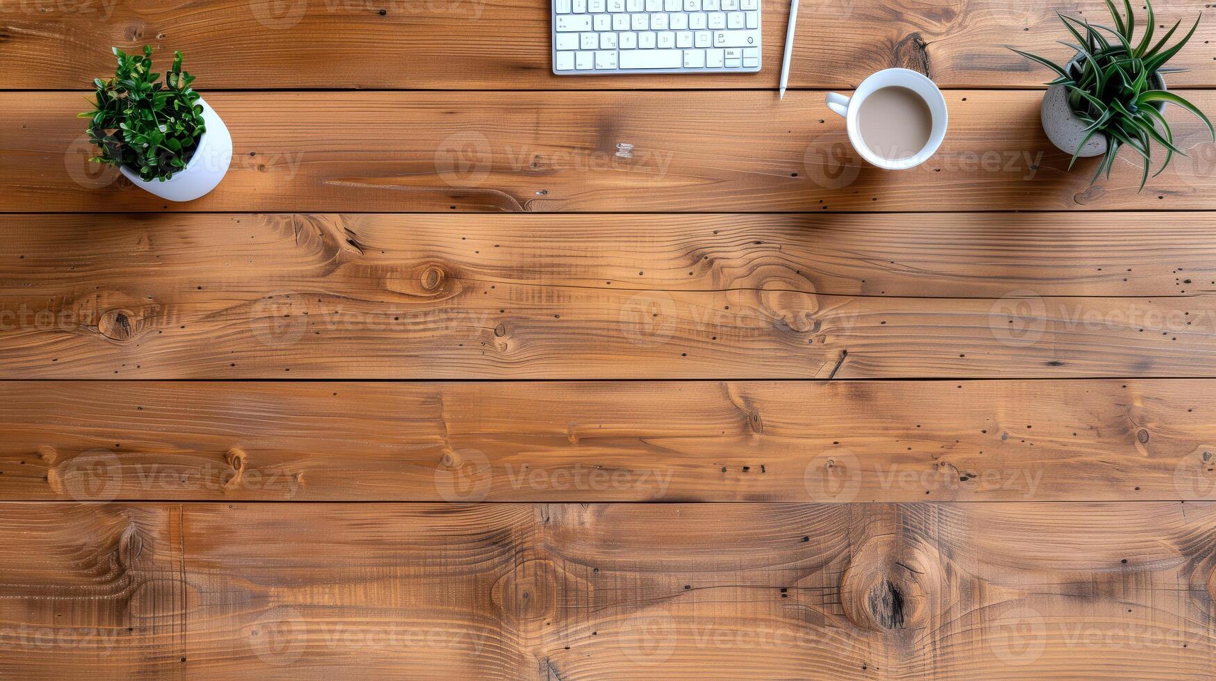 Minimalist Wooden Desk with Plants, Keyboard, and Coffee Cup photo