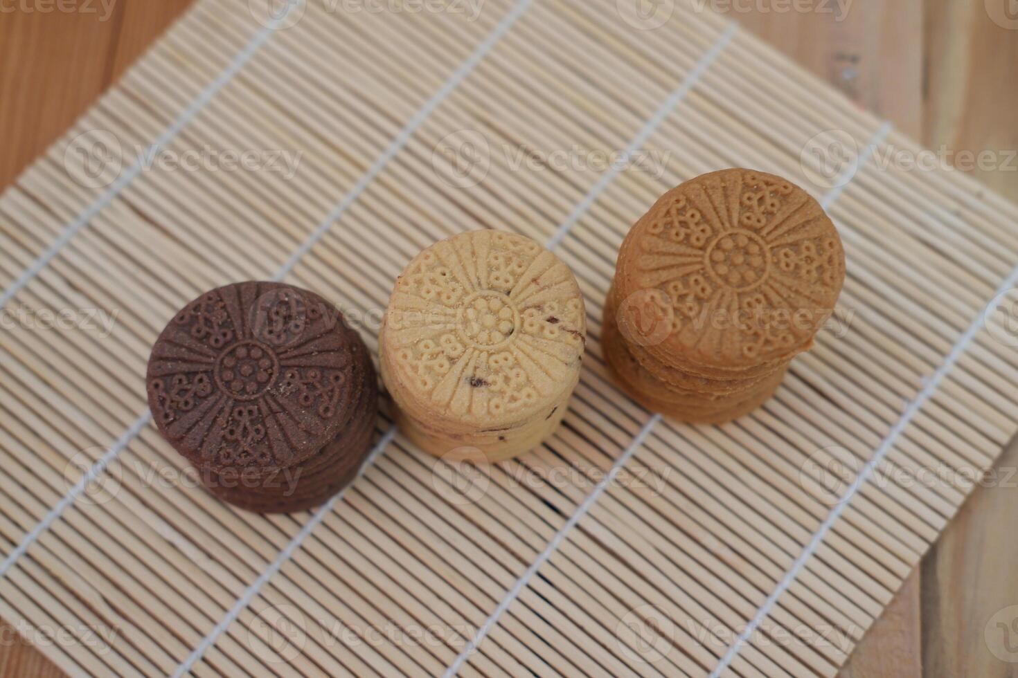 Sandwich cookies on a wooden table. Selective focus, shallow depth of field photo