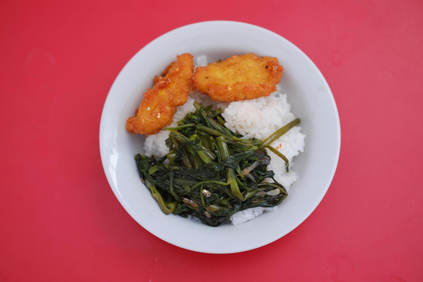 Nutritious plate of food featuring rice and assorted vegetables, a balanced and delicious dish photo