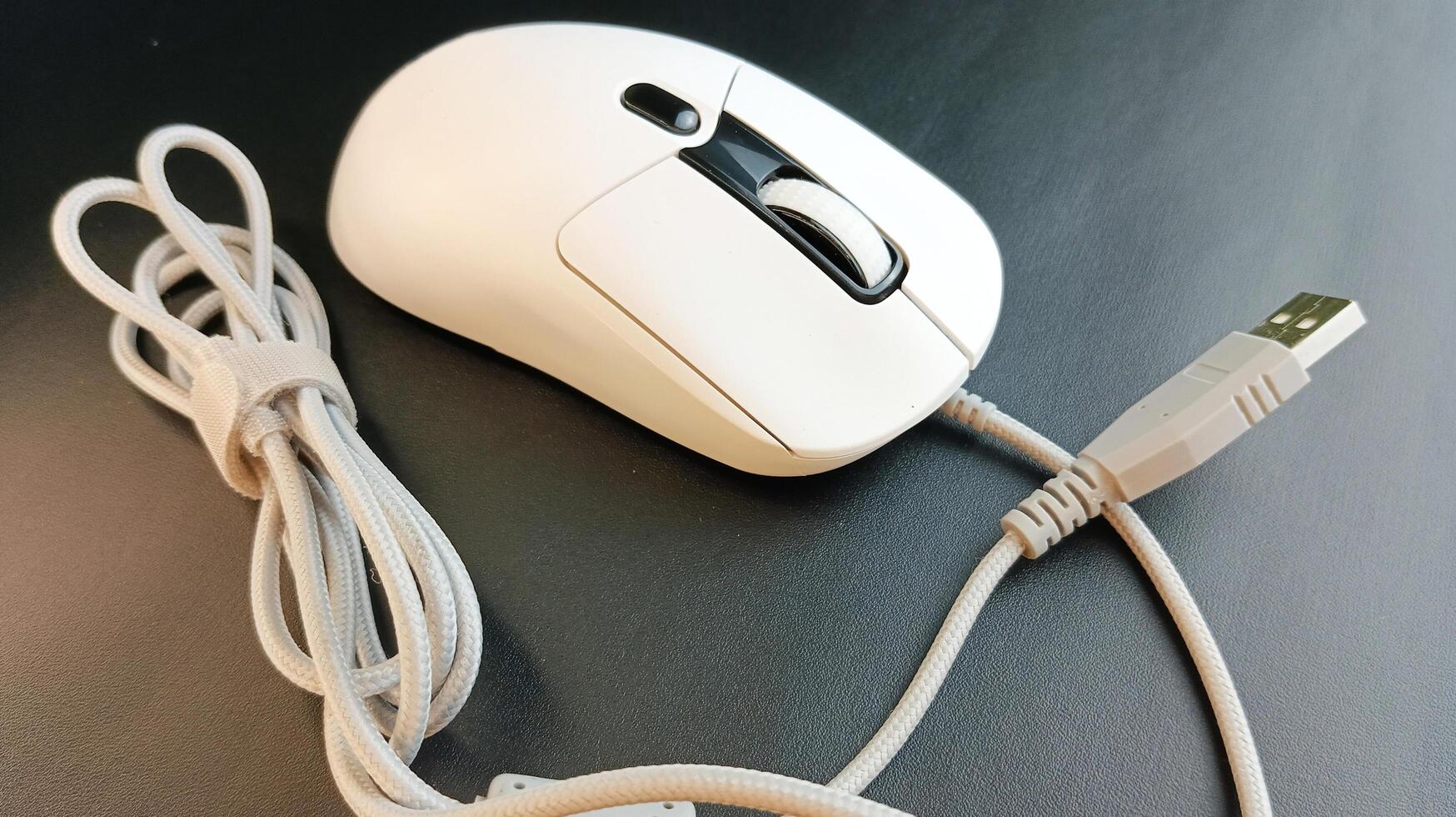 computer mouse on black background photo