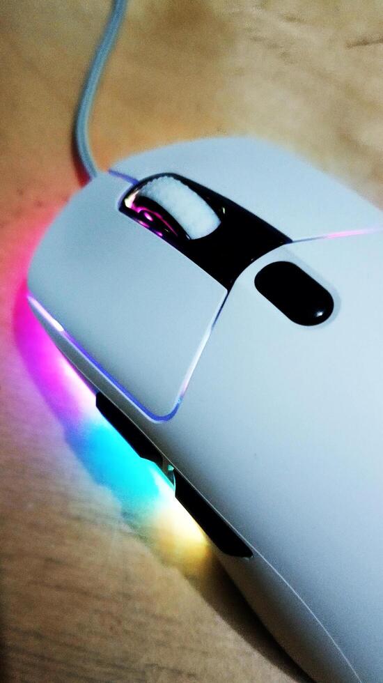 close up of a white computer mouse that lights up photo