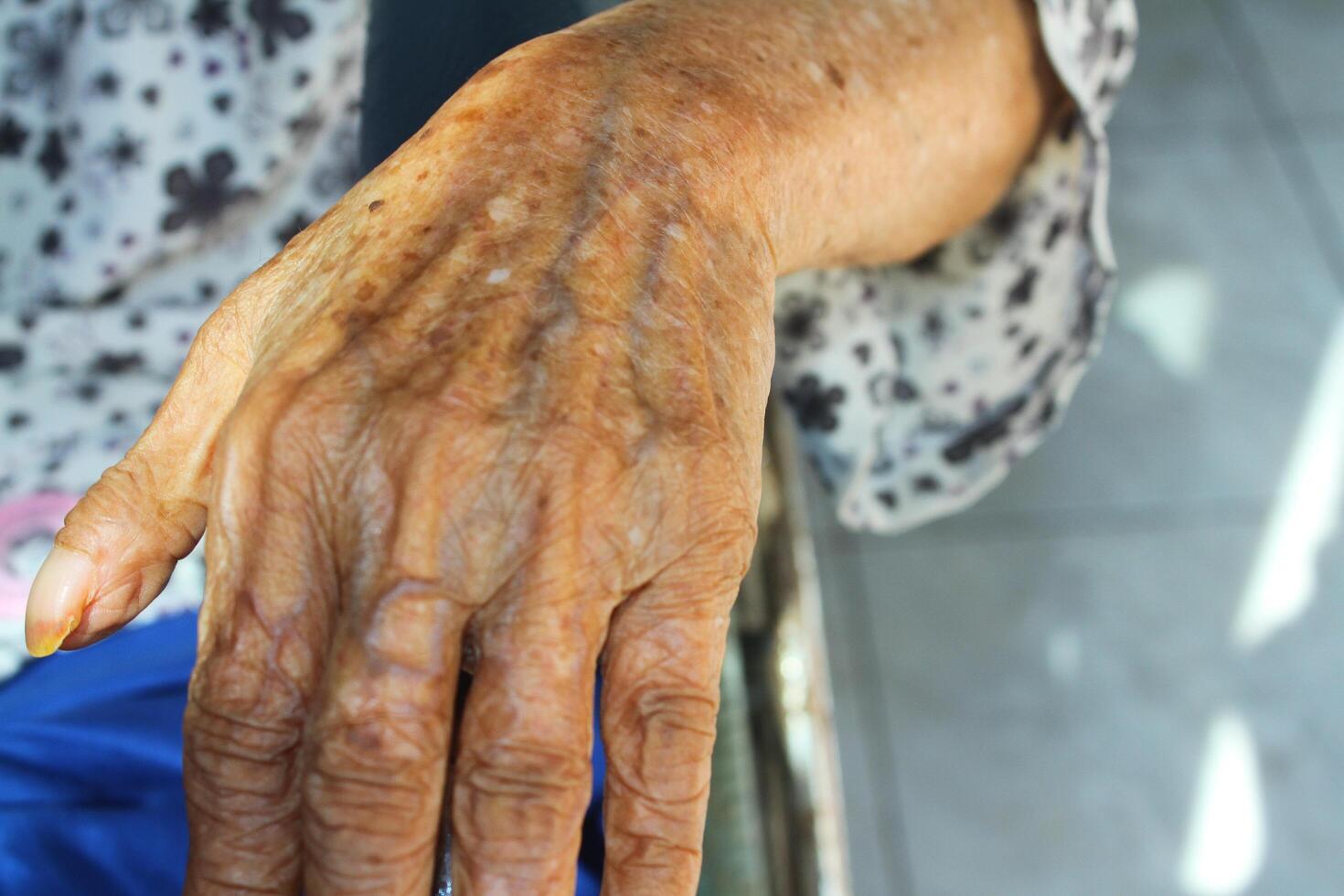 wrinkled elderly hands, holding hands, elderly hands photo