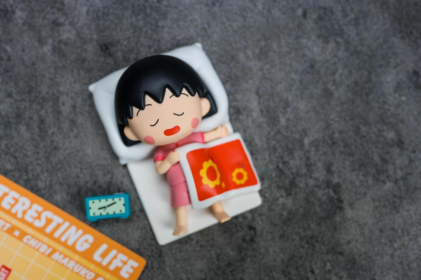 Bangkok, Thailand - June 23, 2024 Overslept Maruko form POP MART Chibi Maruko-chan's Interesting Life Series Blind Box. photo