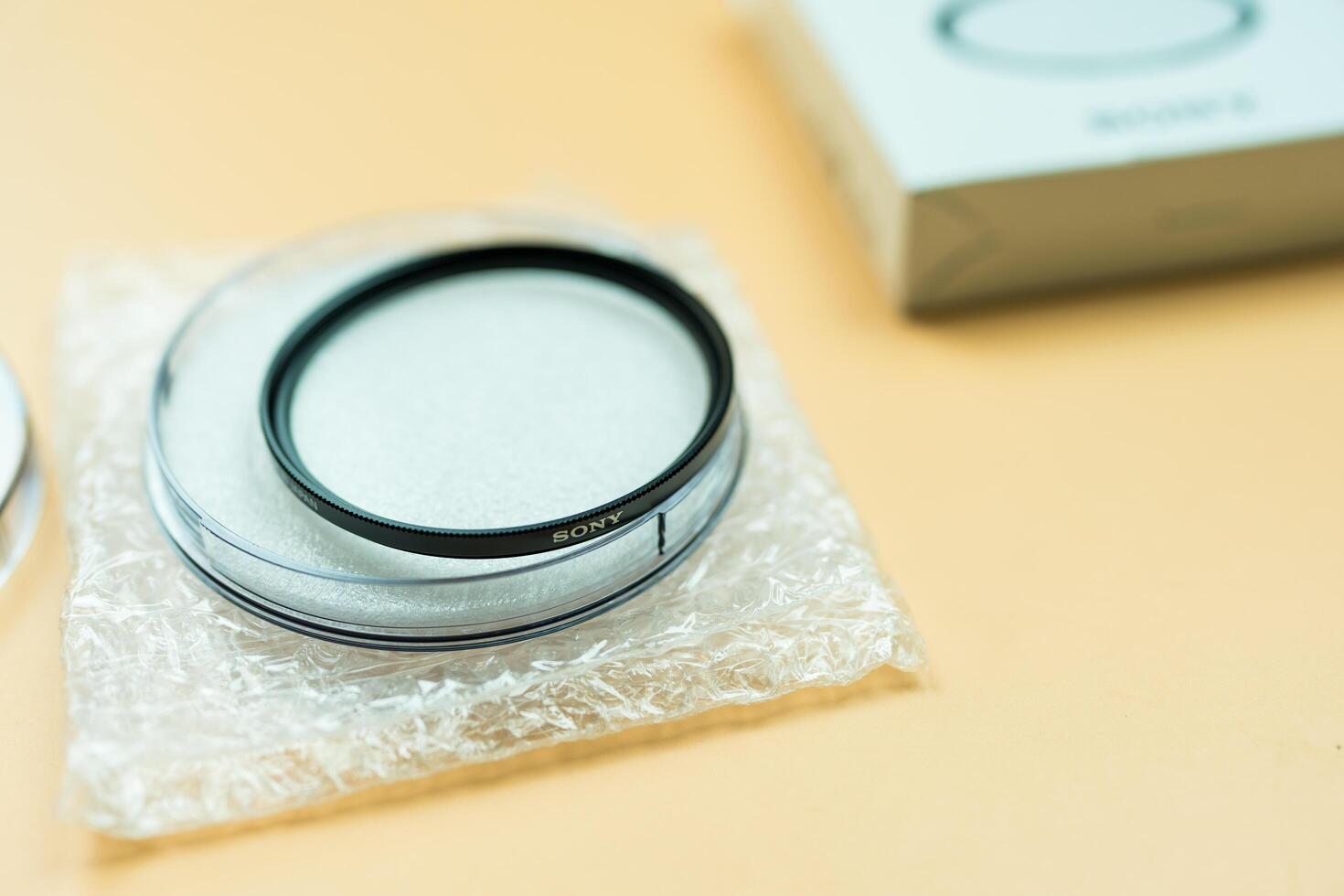 Bangkok, Thailand - June 16, 2024 MC Protecting Filter. High quality optical glass from Sony for DSLR camera. Filter protects the camera lens. photo