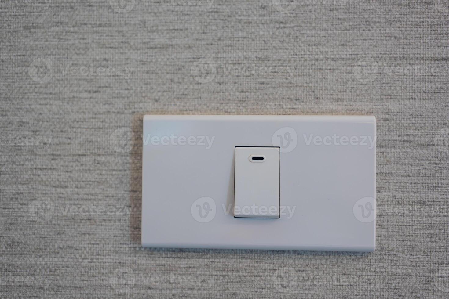Wall switch in light interior. Modern clean home photo