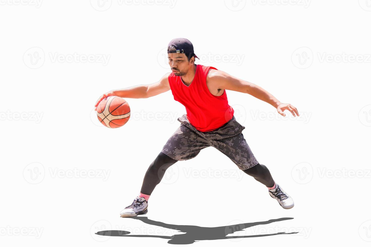 Dynamic Basketball Player Dribbling in Action Isolated on White Background photo