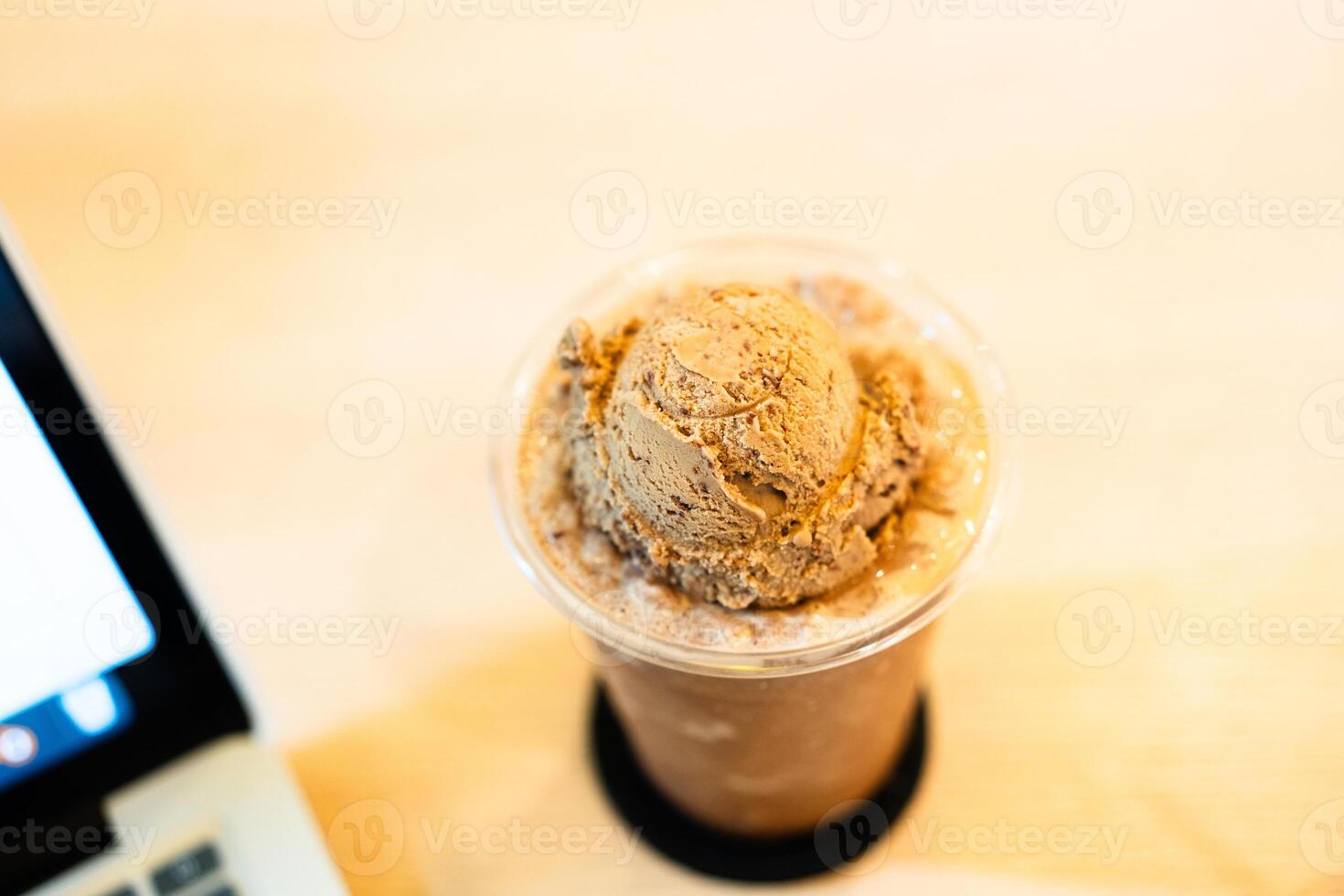 Ice cream coffee float on top of mocha frappe coffee photo