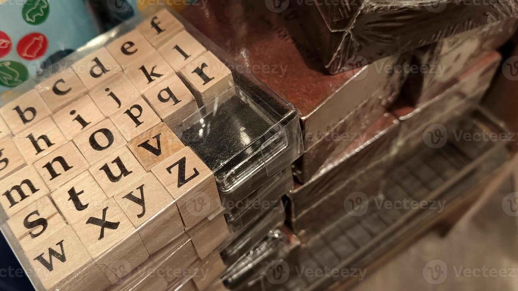 Wooden block toy with letters for children photo