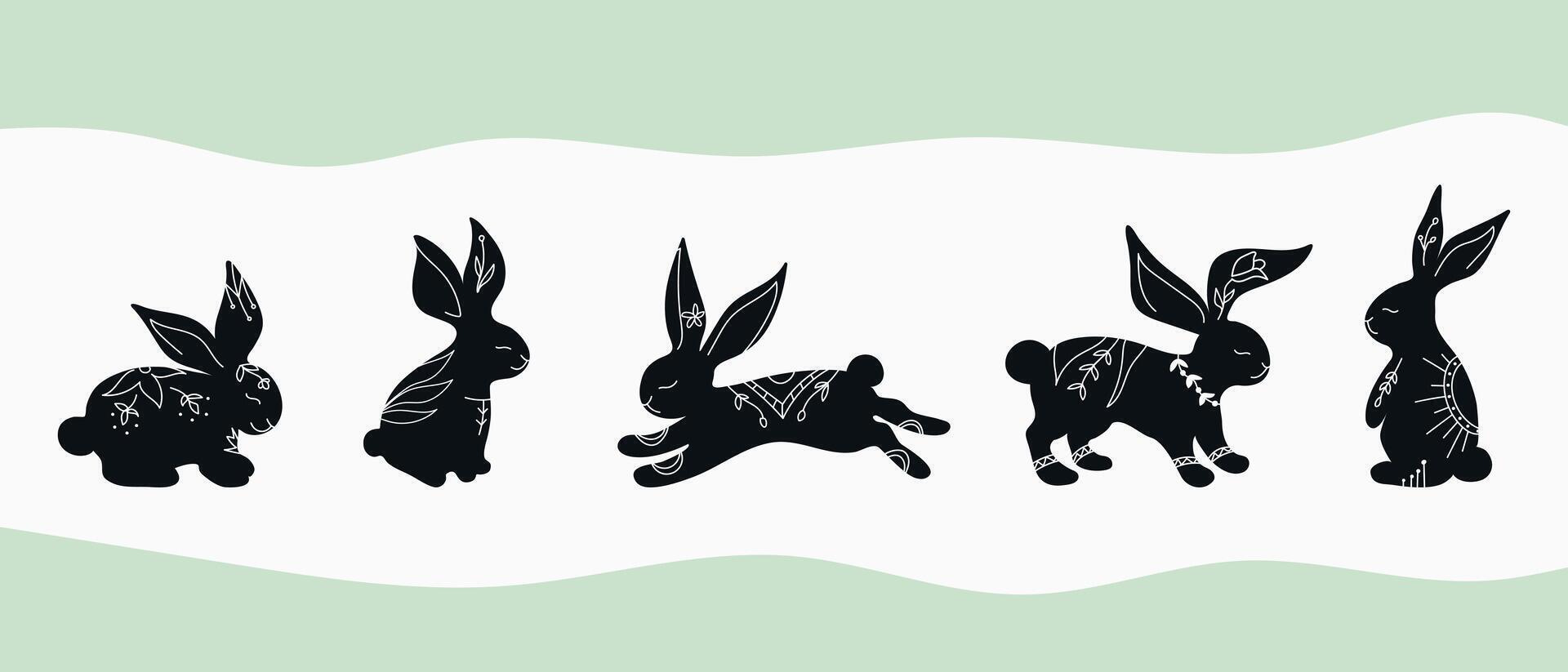 Set of rabbit silhouettes in different poses. Hand drawn rabbits decorated with white ornament with botanical elements. Animals drawing in boho style. illustration vector