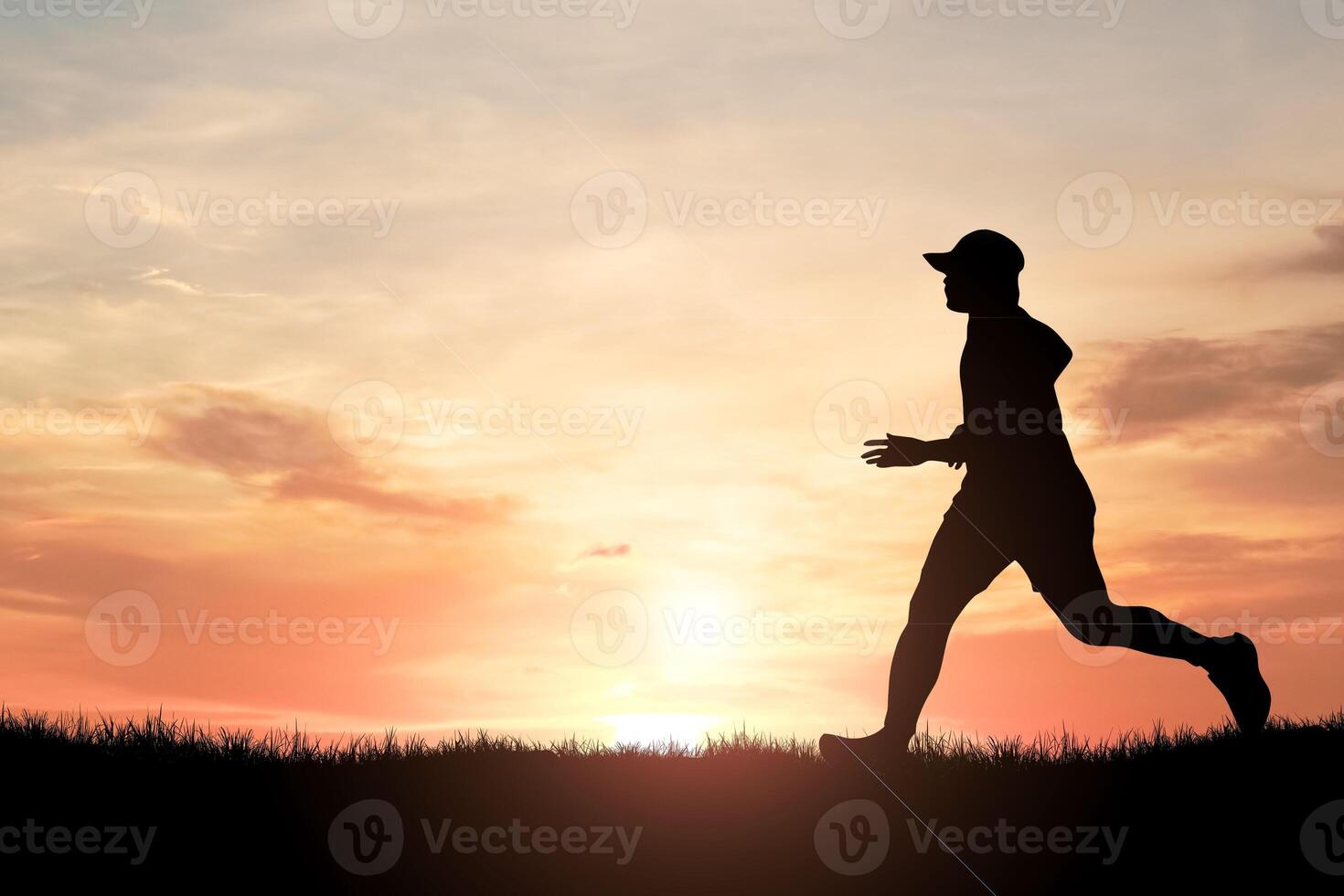 Silhouette of a Person Running at Sunset with Vibrant Sky and Sunlight in the Background, Capturing the Essence of Outdoor Fitness and Healthy Lifestyle in a Scenic Natural Setting photo