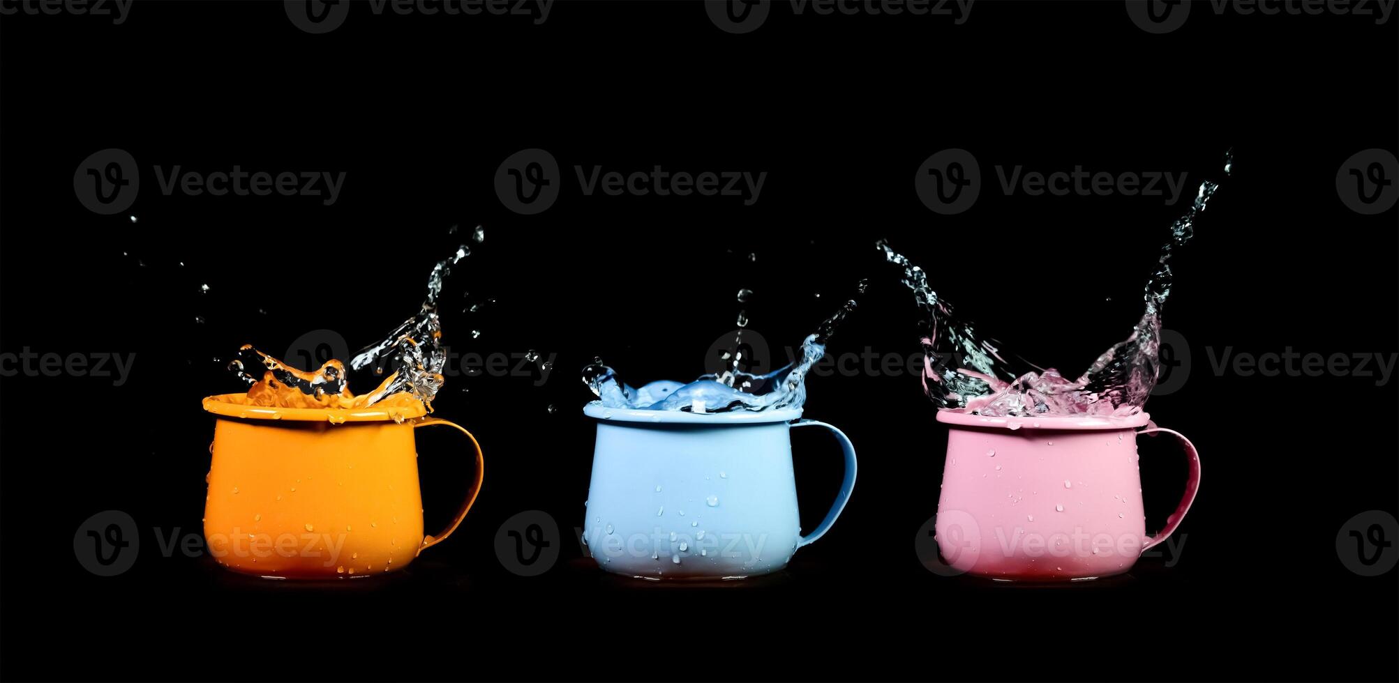 Vibrant Splashing Water in Colorful Mugs on Black Background - Dynamic and Energetic Still Life Photography photo