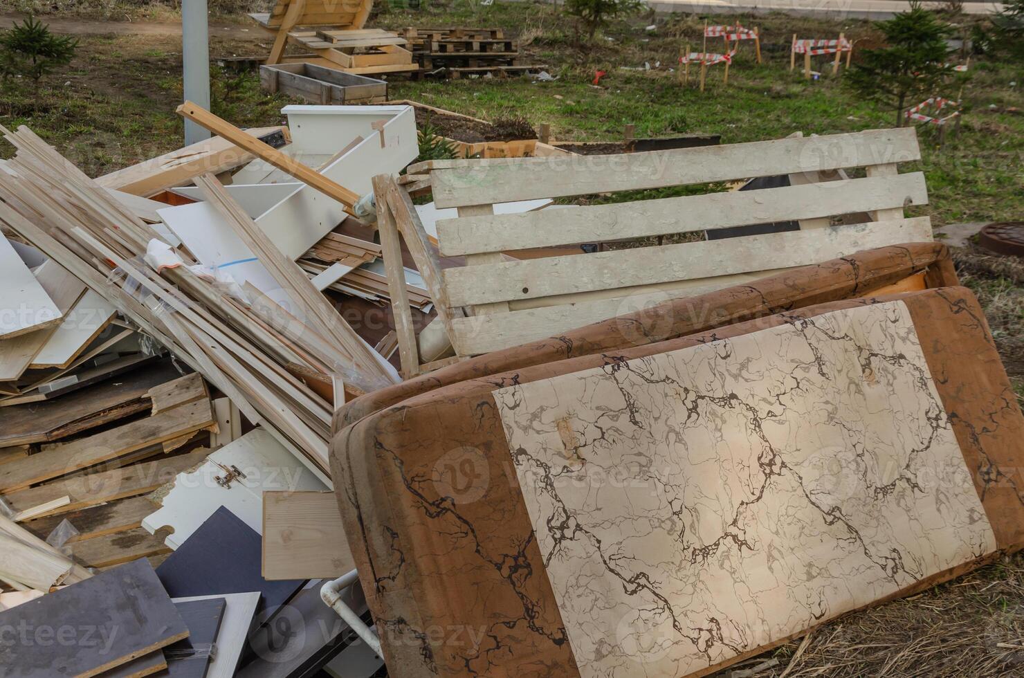 Garbage is lying in the city next to residential buildings. High quality photo