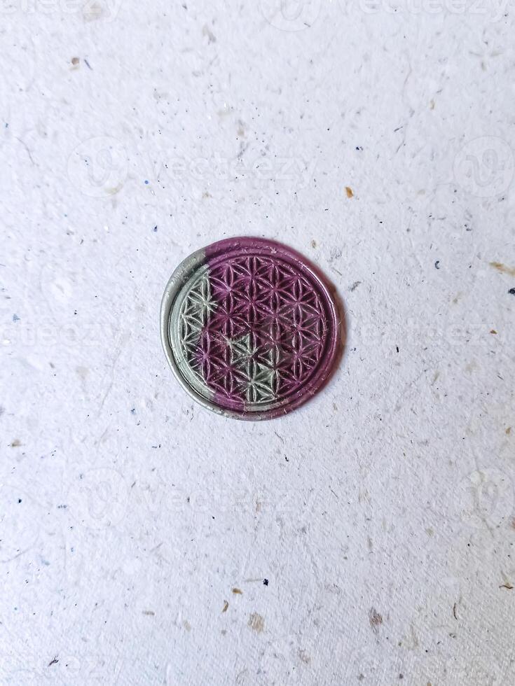 colorful wax stamp on white background. isolated. round photo