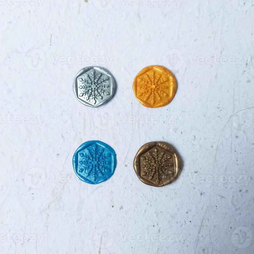 colorful wax stamp on white background. isolated. round photo