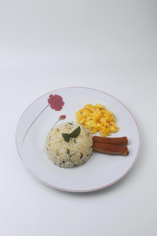 One plate of lime leaf fried rice made from rice mixed with lime leaves photo