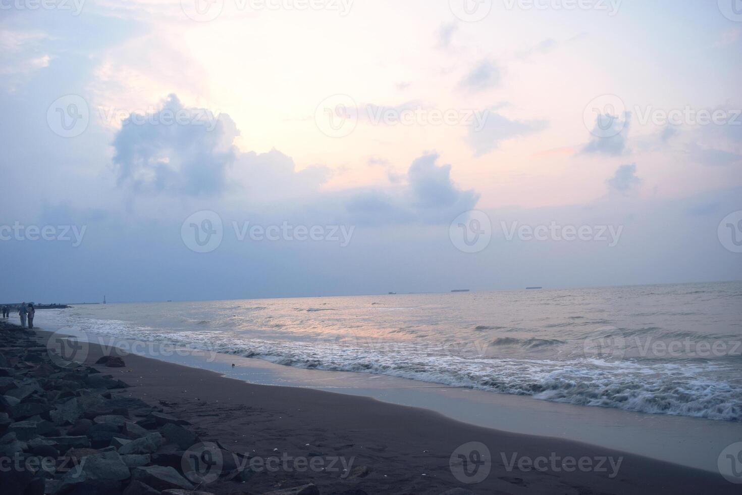 Atmosphere on the beach cities of Tegal which is often called Pantai Alam Indah photo