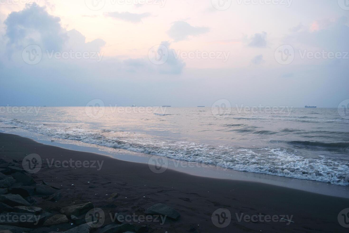 Atmosphere on the beach cities of Tegal which is often called Pantai Alam Indah photo