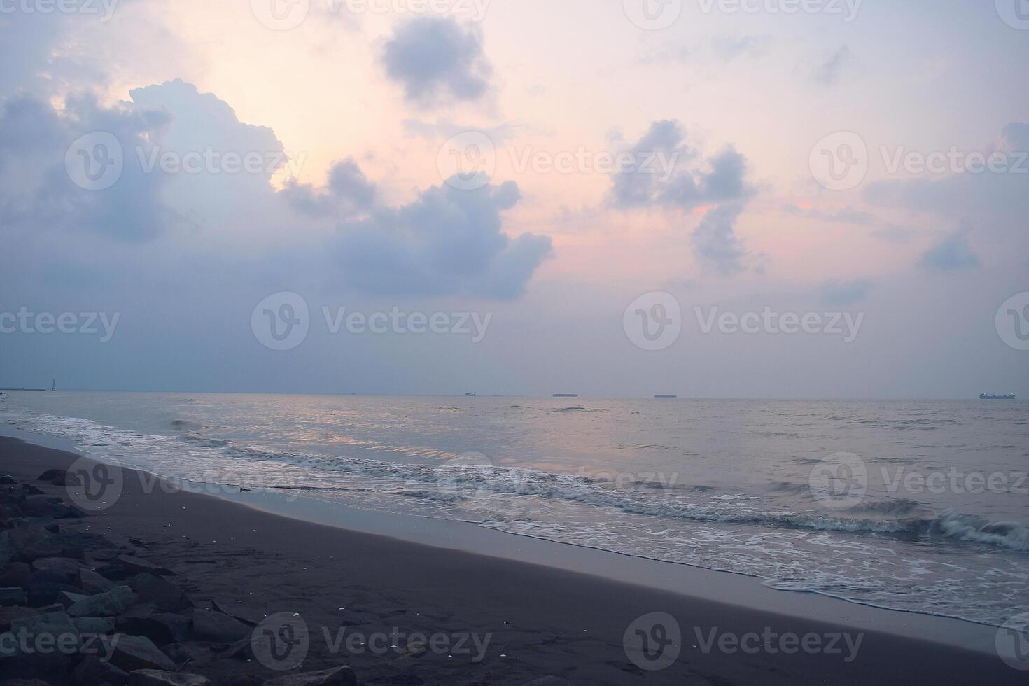 Atmosphere on the beach cities of Tegal which is often called Pantai Alam Indah photo