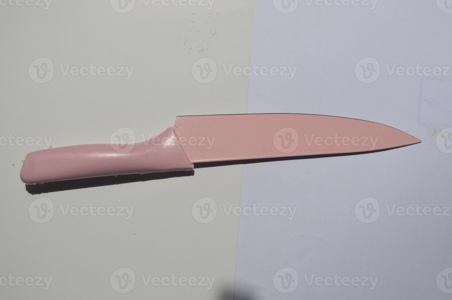 sharp kitchen knives used for cooking, knife set of various shapes and uses put together on a white background photo