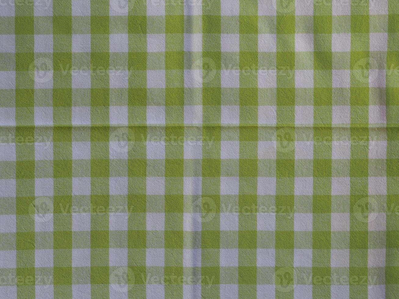 green and white chequered fabric texture background photo