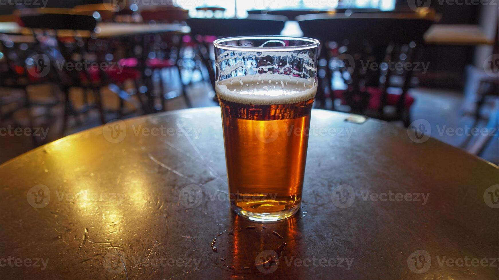 british ale beer pint in pub photo