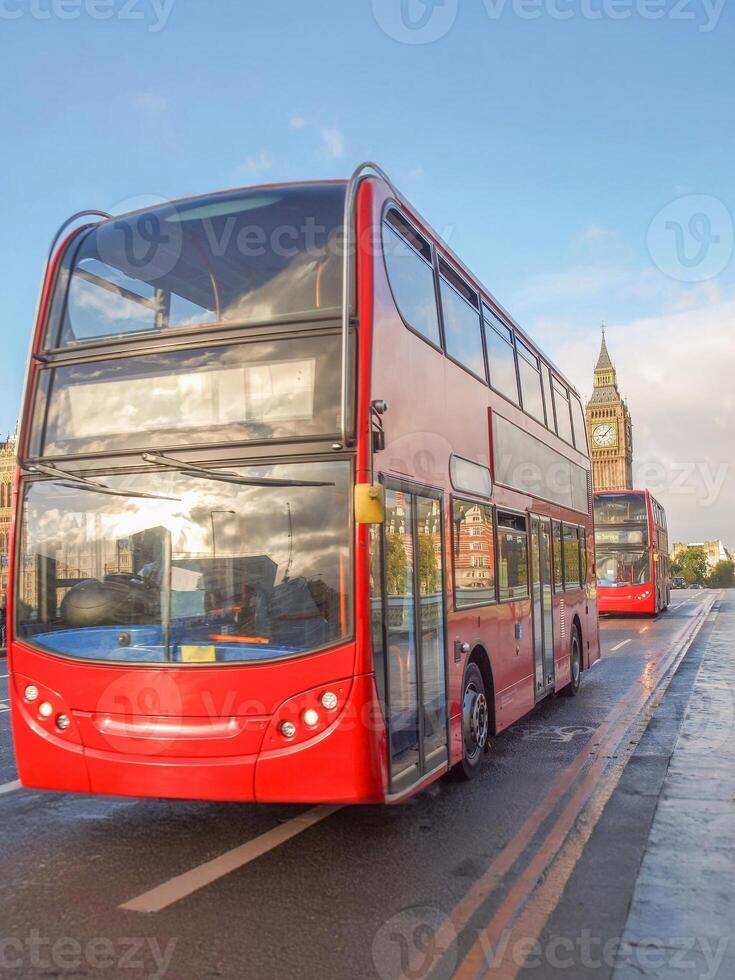 double decker red bus in London, UK photo