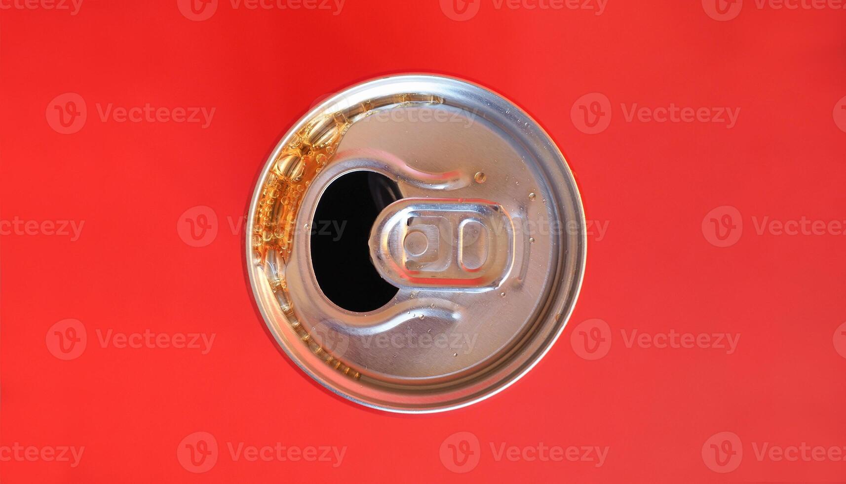 cola tin can red background photo