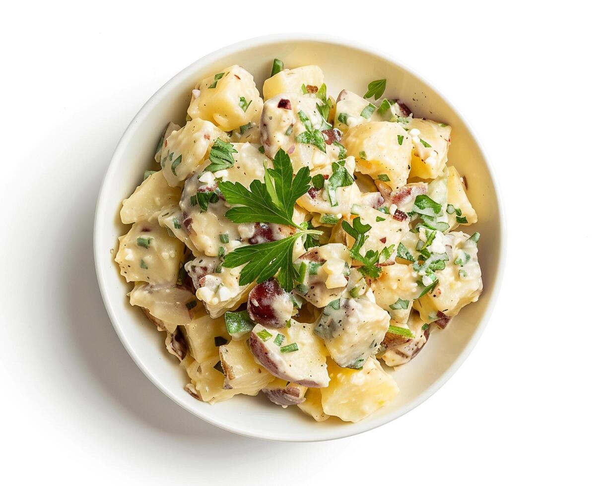 potato salad with bacon and herbs in a bowl photo