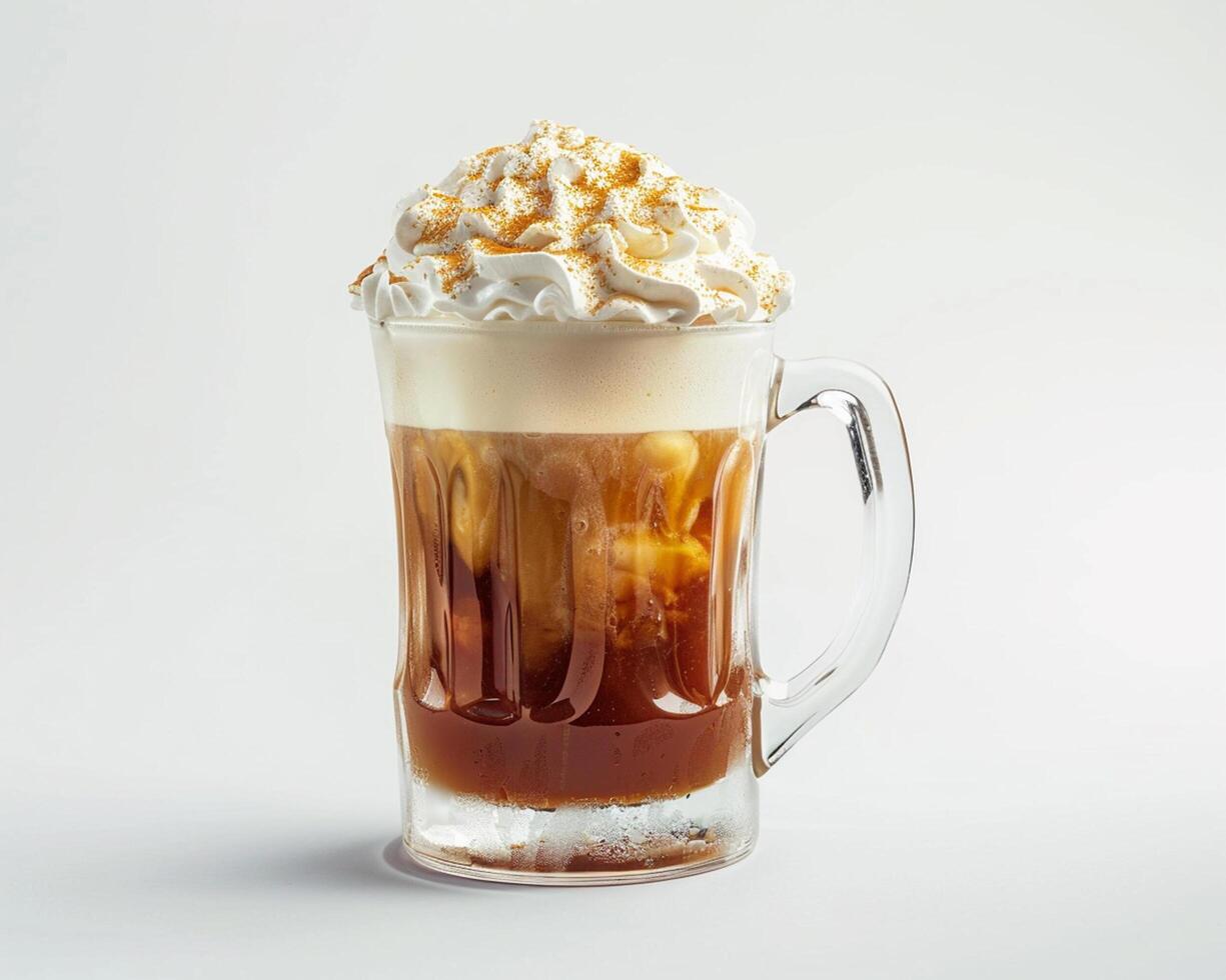 a glass of coffee with whipped cream and caramel photo