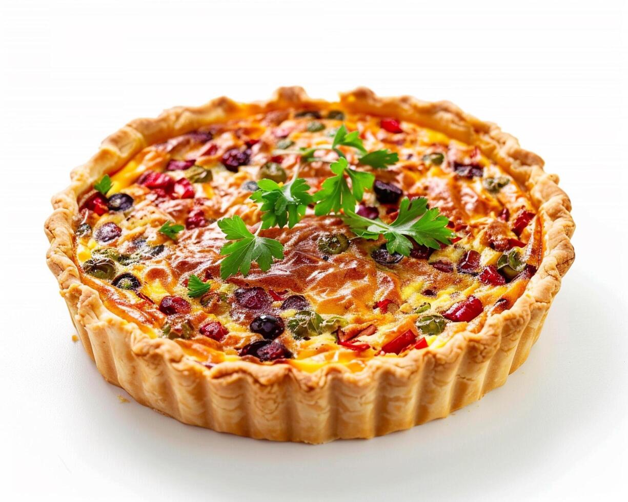 a quiche with vegetables and herbs on a white surface photo