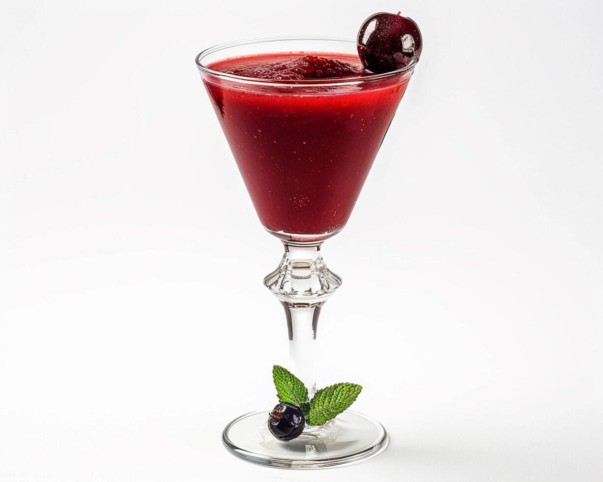 a glass with a cherry on top photo
