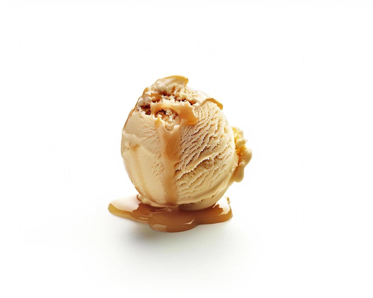 a scoop of ice cream with caramel drizzle on top photo