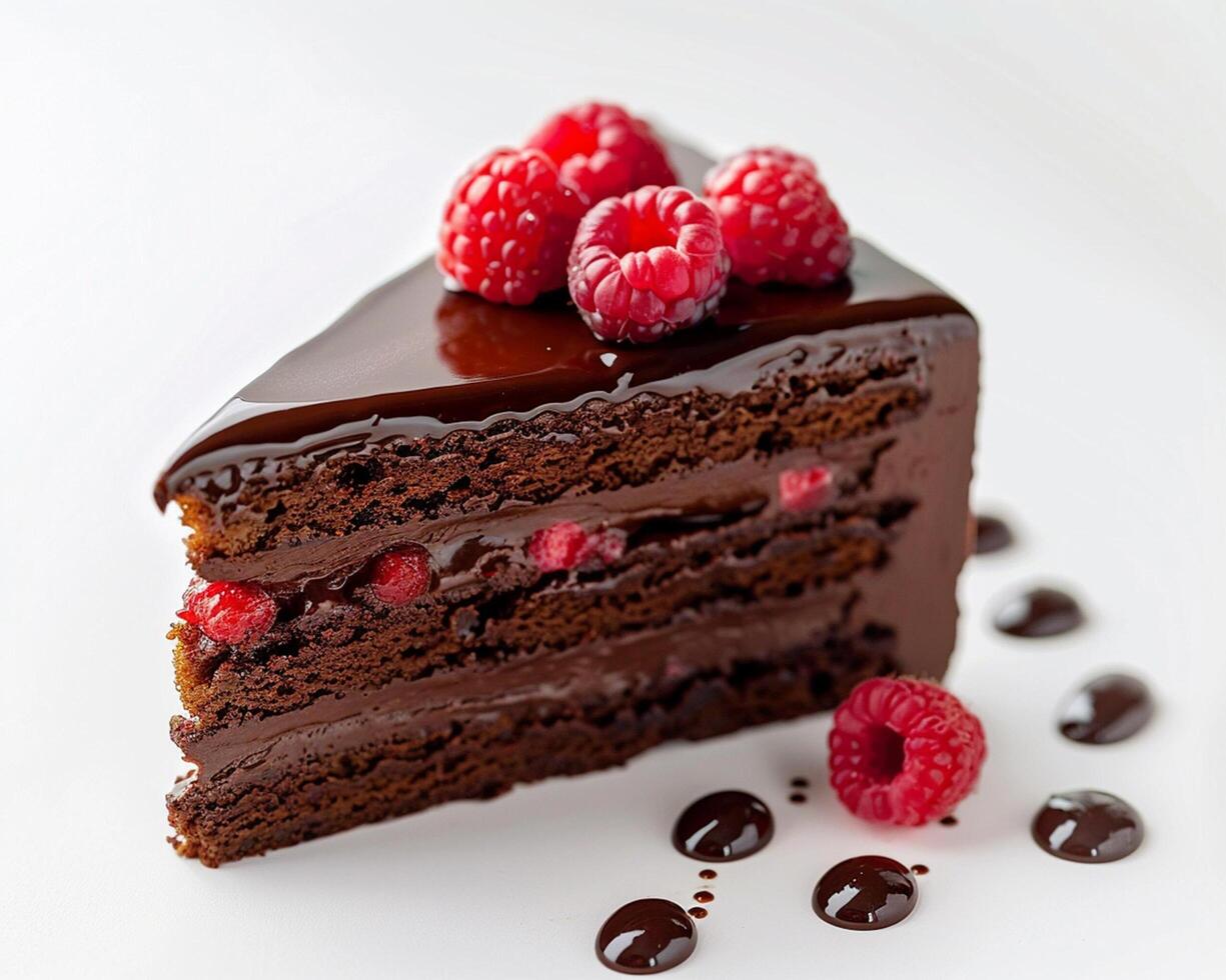 a piece of chocolate cake with raspberries on top photo