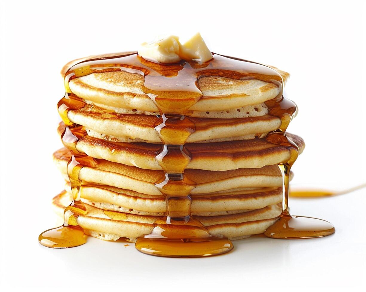 a stack of pancakes with syrup on top photo