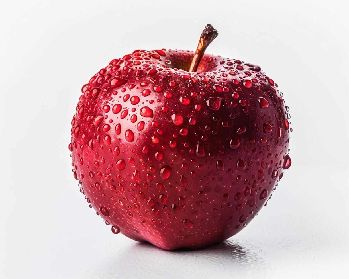 a red apple with water droplets on it photo