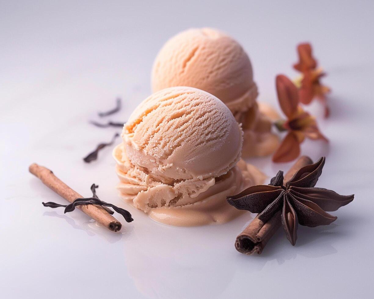 two scoops of ice cream with cinnamon and vanilla photo