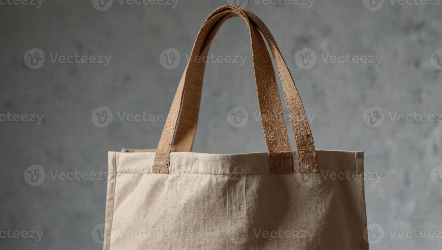 Close up of young woman holding canvas fabric bag for mockup on simple background, blank template, Ecology or environment protection concept White eco bag for mock up. photo