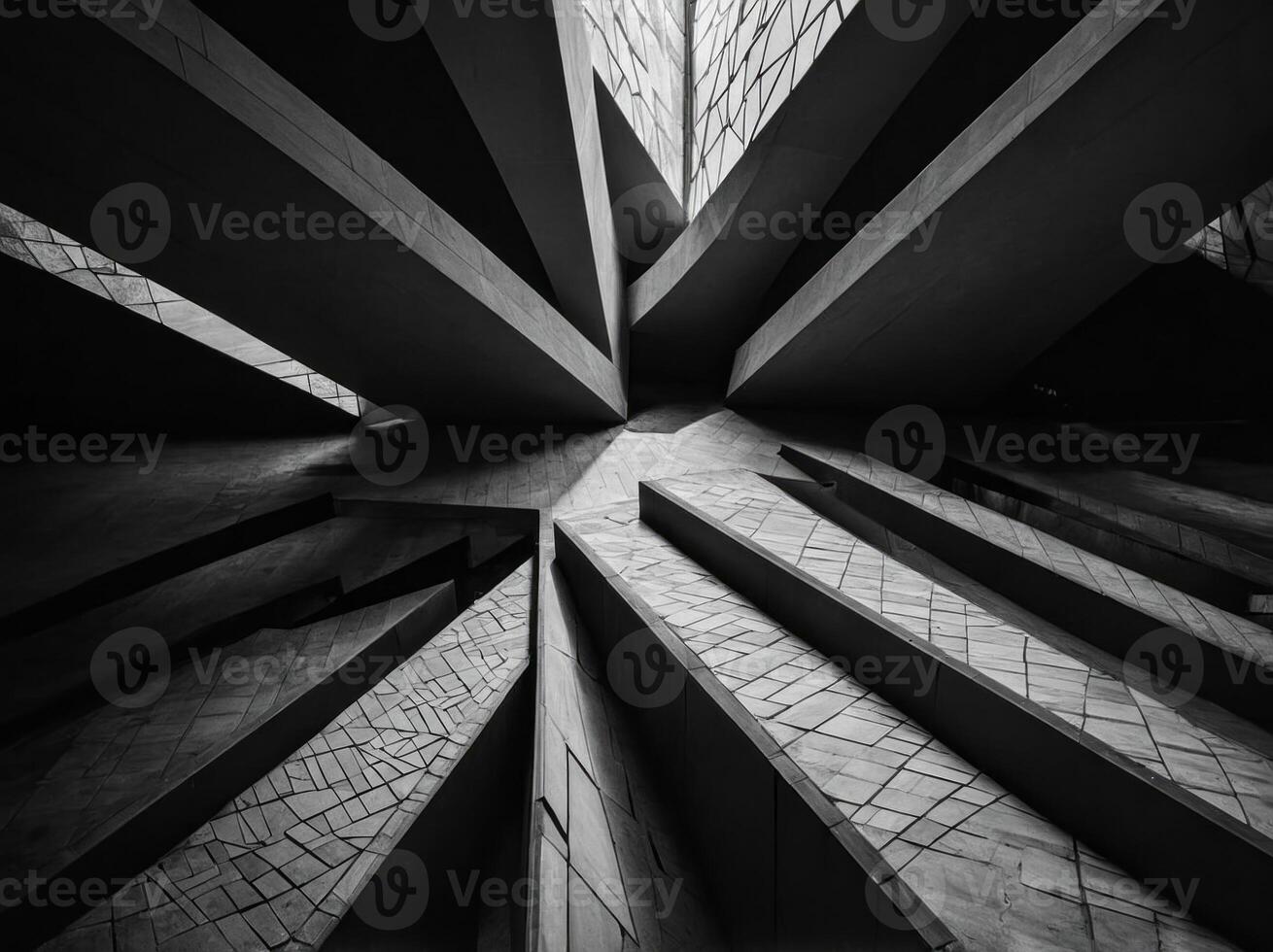 A photo capturing the stark beauty of a geometric design with sharp angles and intersecting lines in high contrast black and white.