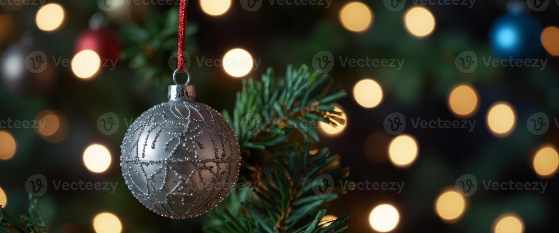 Abstract blur decoration ball and light string on christmas tree with bokeh light background winter holiday seasonal. photo