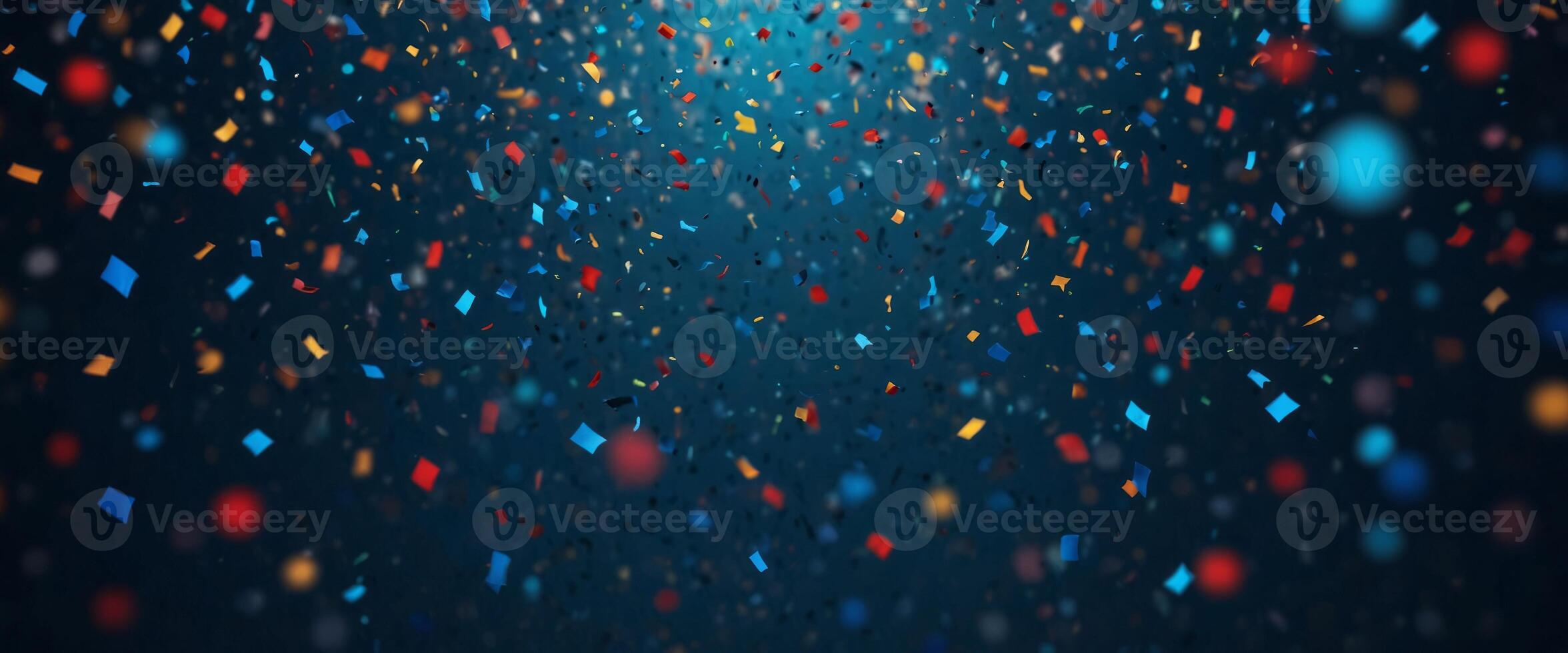 Abstract blue background with colorful confetti for a festive holiday atmosphere. photo